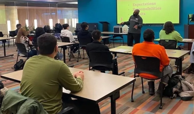 Students sitting at desks during a Job Prep class with instructor at the front of the room